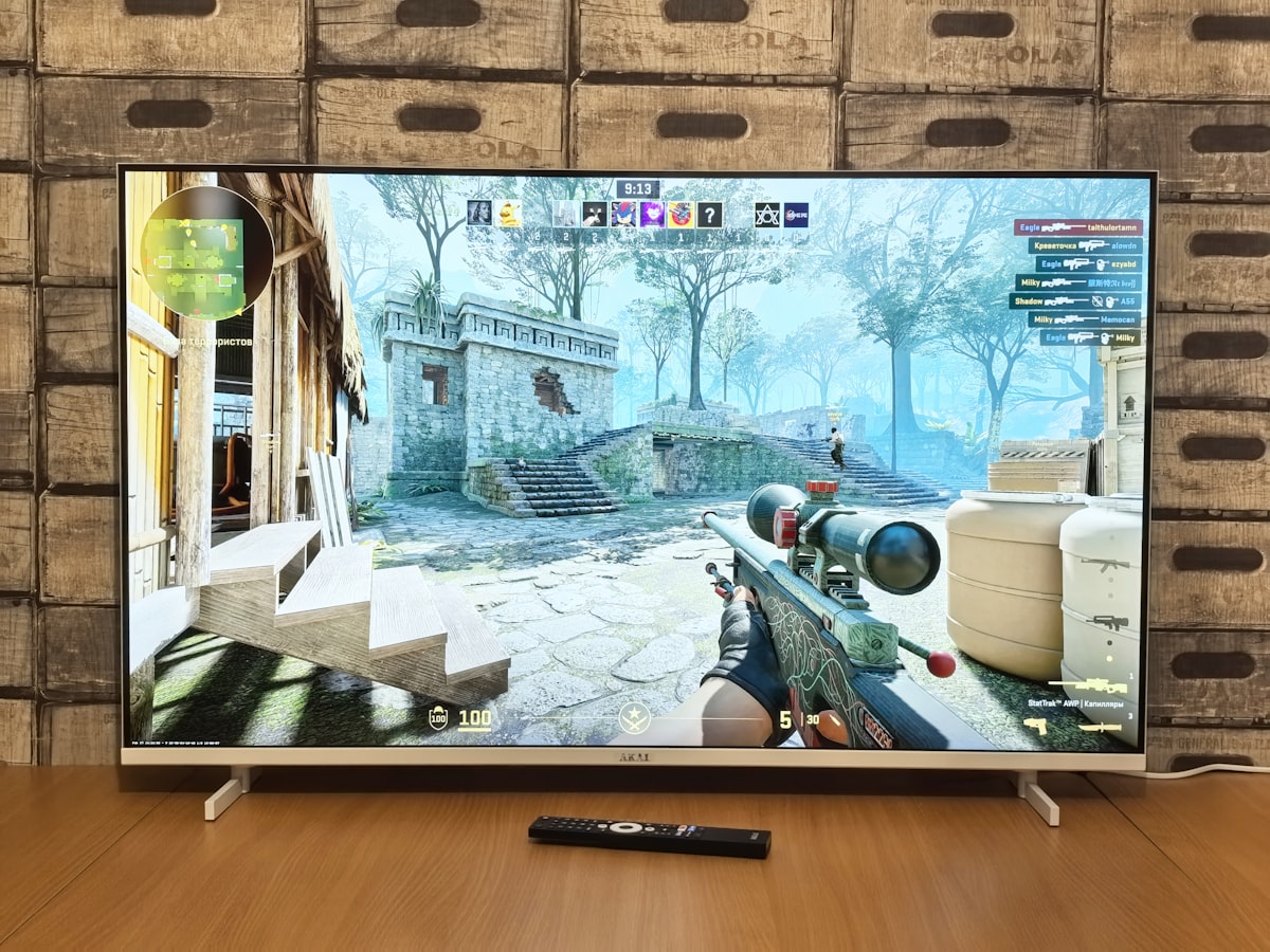 Televisor con videojuego para calcular consumo de una consola